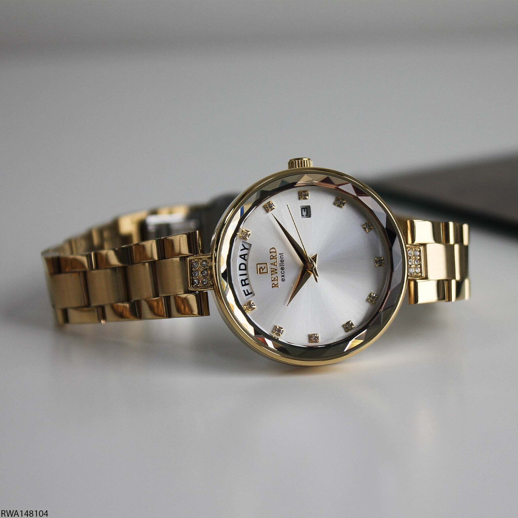 Reward RWA148104 Beyaz Kadran Gün ve Tarih Göstergeli Altın Renk Kadın Kol Saati
